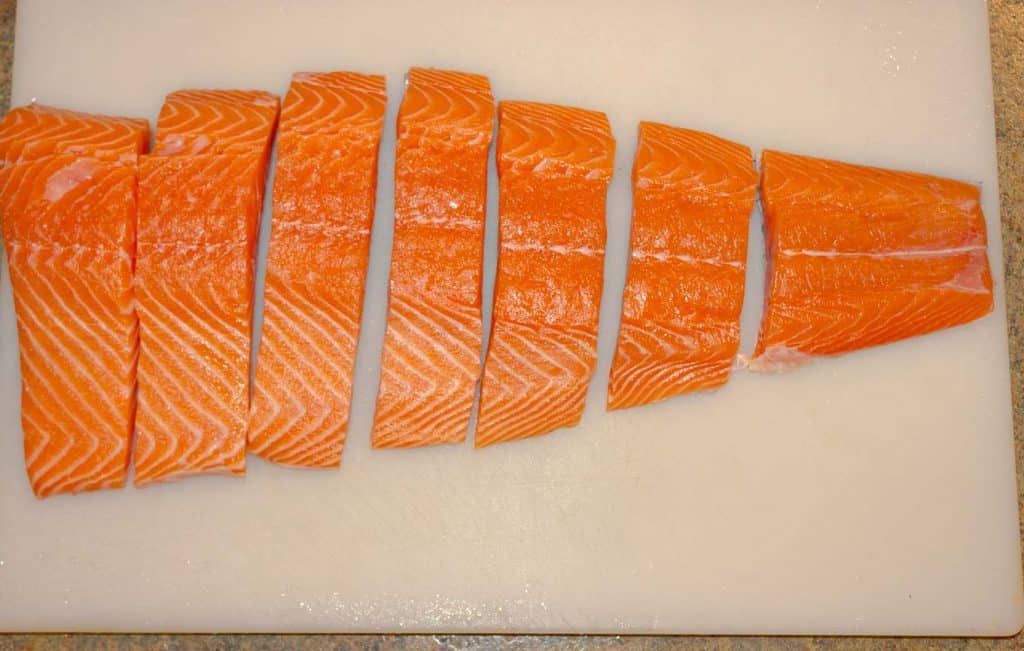 side of salmon cut into portions 