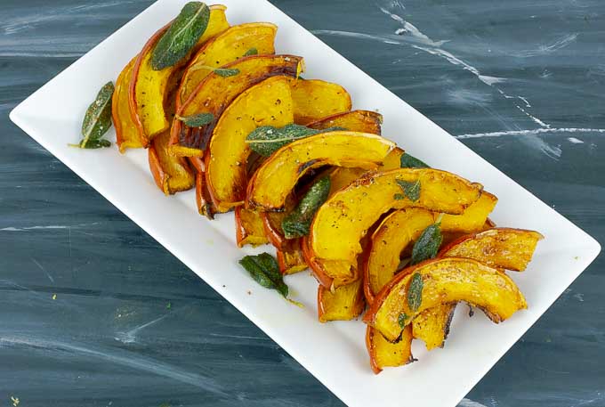 white serving tray of Roasted Pumpkin with Brown Butter and Crispy Sage