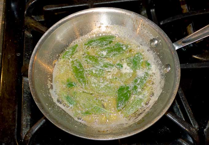 simmering butter with sage leaves