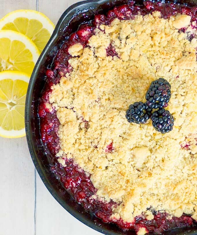 the left side of a pan of Cast Iron Skillet Blackberry Crumble