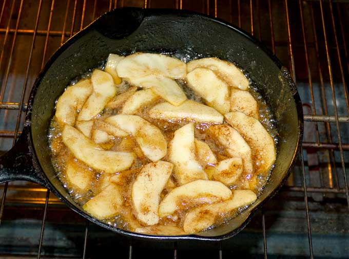 apples and caramel in a cast iron skillet