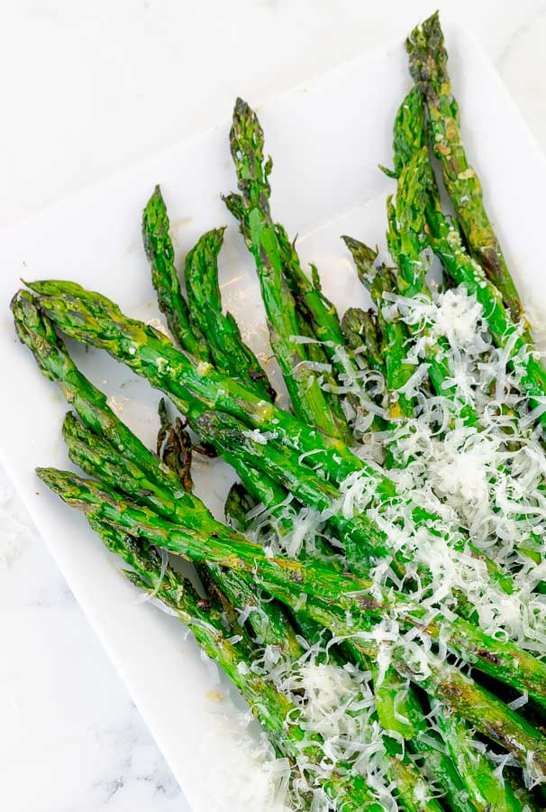 Easy Grilled Parmesan Asparagus on white plate
