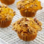 Easy Pumpkin Muffins with Pecan Streusel on wire cooking rack