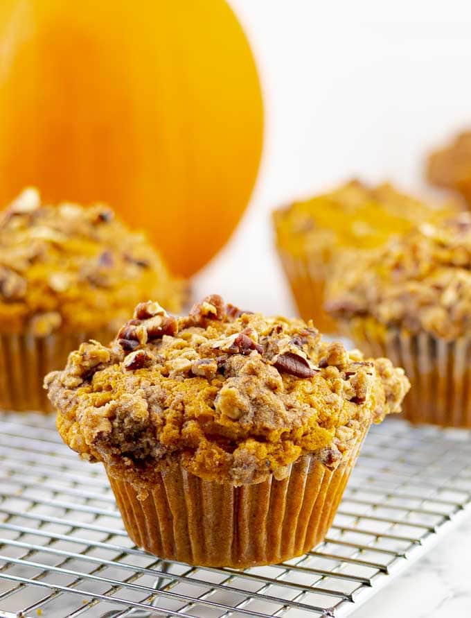 an Easy Pumpkin Muffins with Pecan Streusel on wire cooking rack