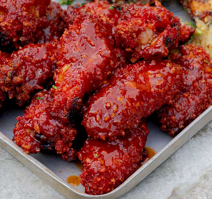 Extra Crispy Sweet and Spicy Wings on a metal baking sheet