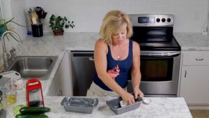 Jennifer greasing loaf pans