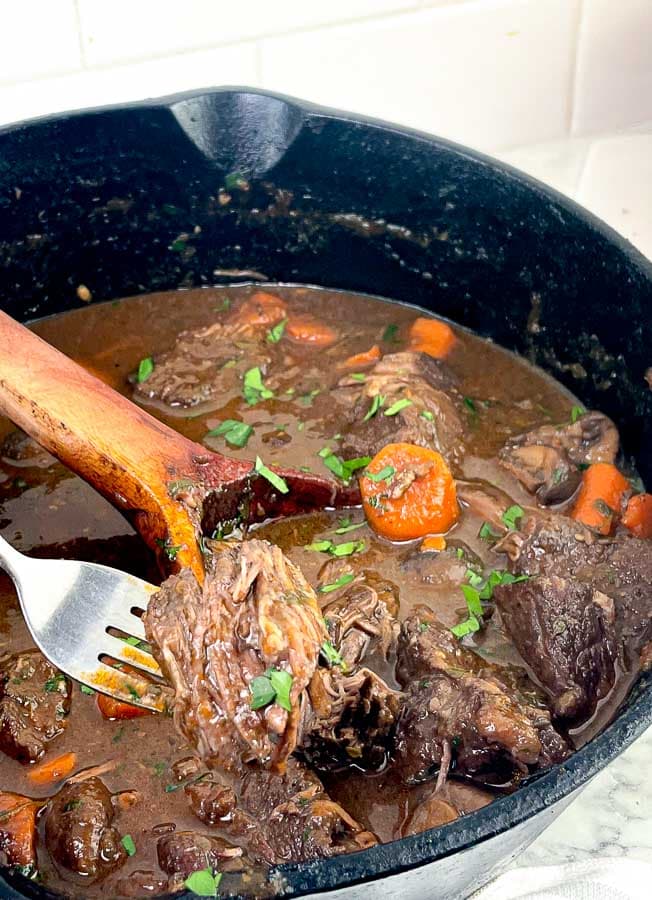 dutch oven with Red Wine Beef Stew with Mushrooms and Carrots