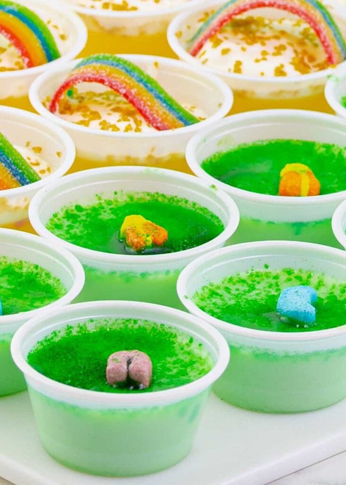 Key Lime Lucky Charms Jello Shots and pot o gold hots on a white tray.