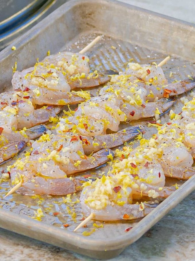 marinating skewers of shrimp